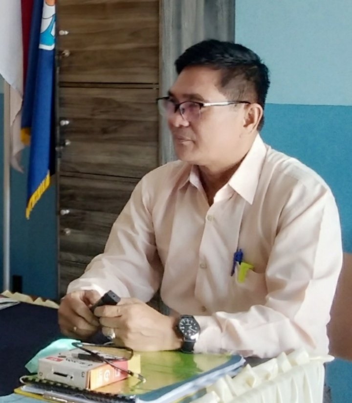 I MADE SUGIANA, S. Sos.,M.I.Kom